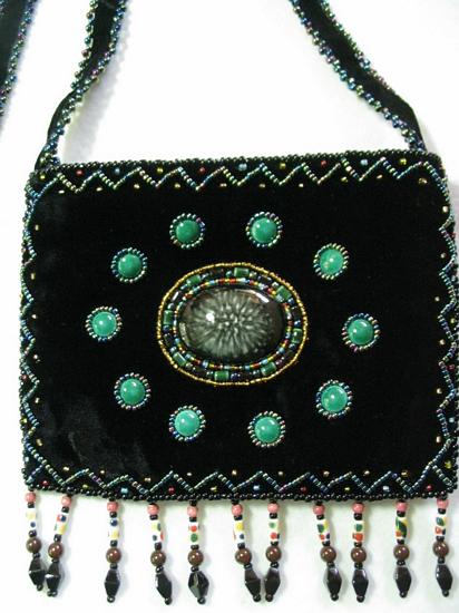 Black small purse w/ 10 pts. around center